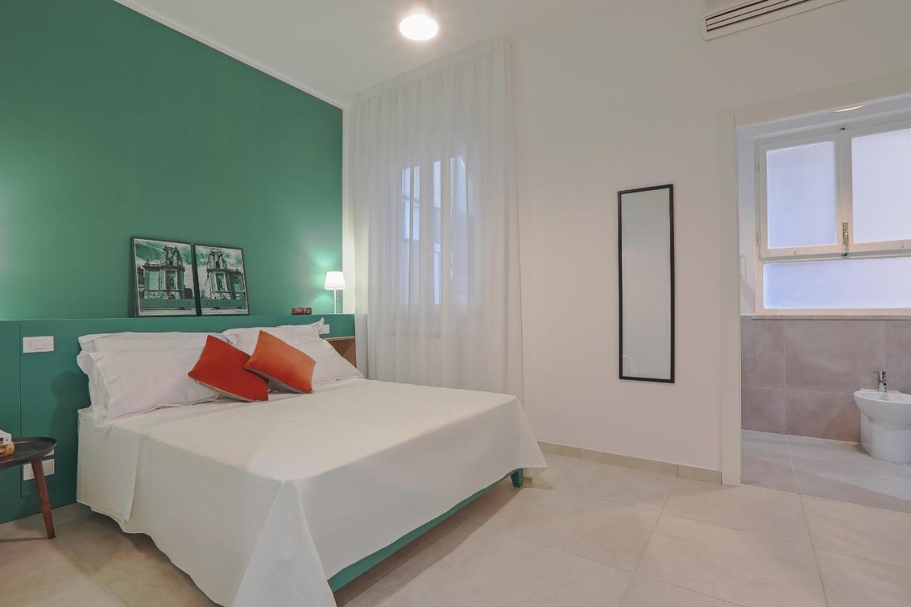 Liberta Central Suites Palermo Bagian luar foto